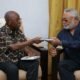 Former clerk of Parliament presents books to Rawlings