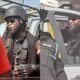 Identity Of The Bearded Police With Earring Finally Revealed, Shows He's The Brother Of An NPP MP